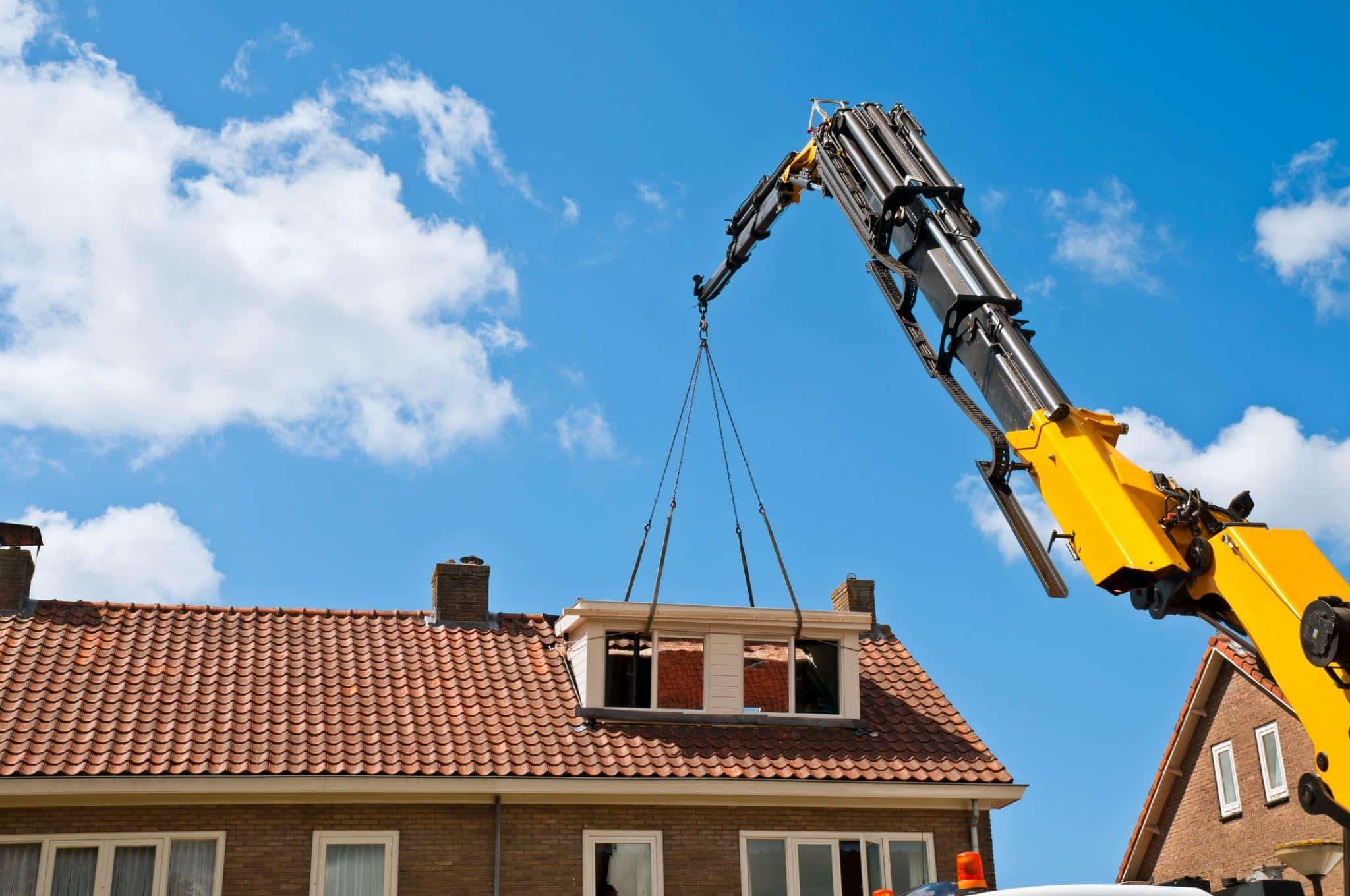 A Crane Attached To A Dormer | DIY Home Renovation Equipment